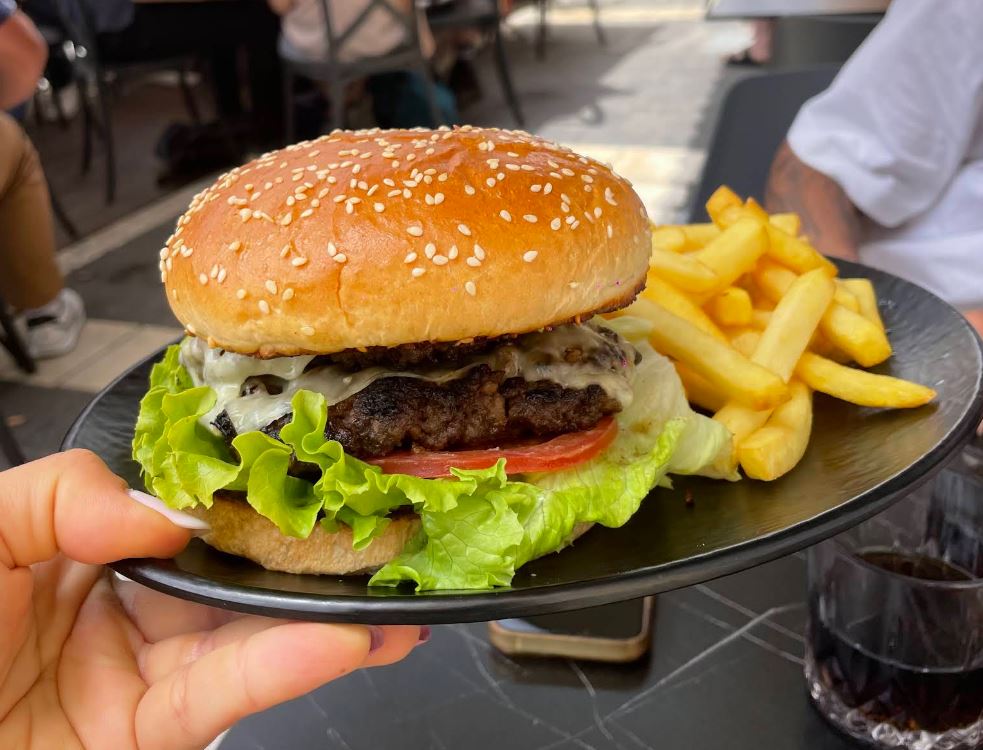 Juicy gourmet burger with fries